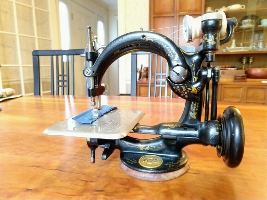  Willcox and Gibbs treadle base with 1893 parts machine